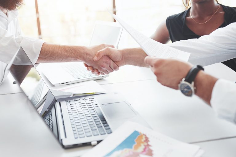 handshake mean successful contract between companies conception of business